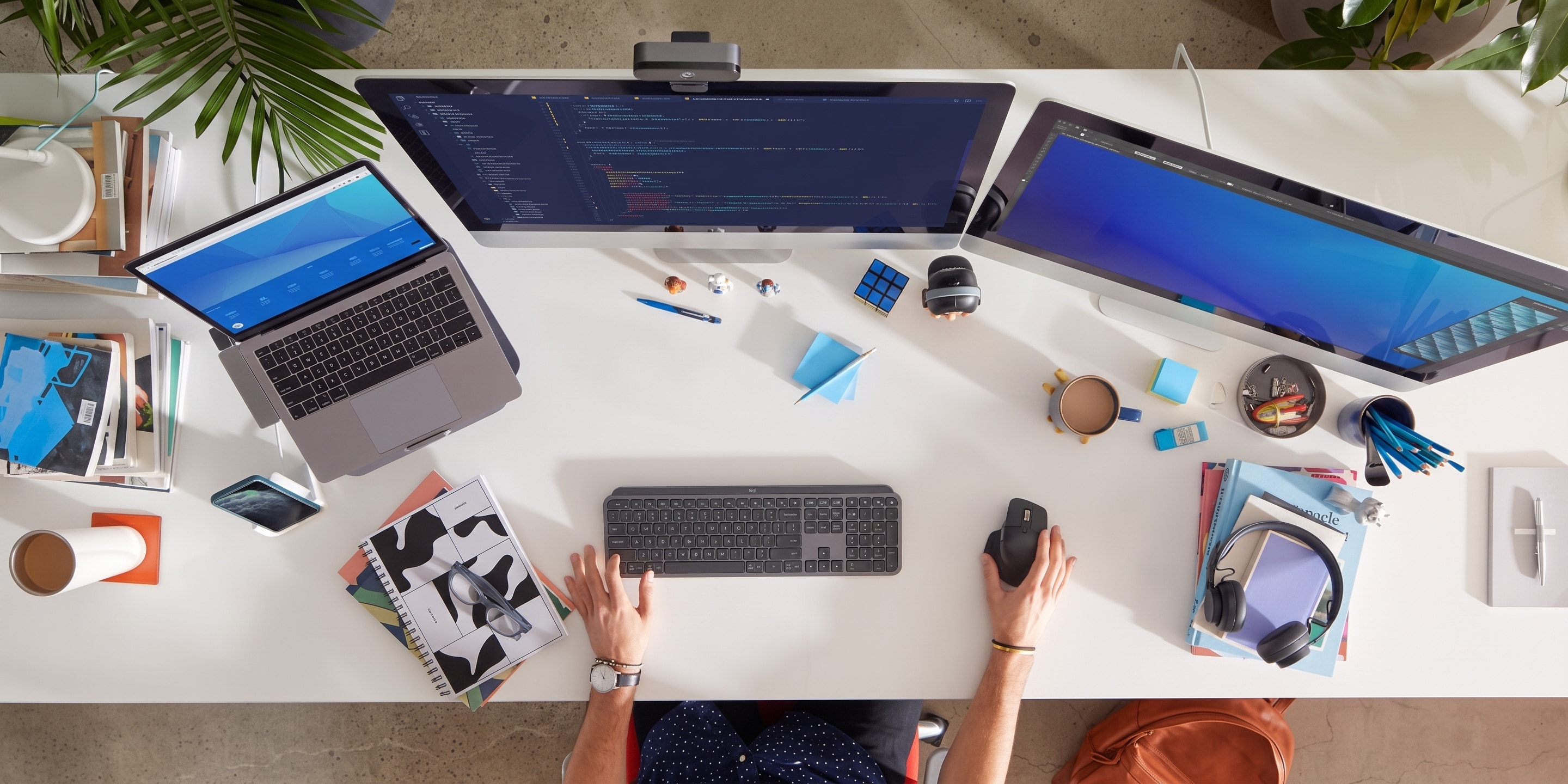 Logitech MX Master, MX Keys and Brio on a desk
